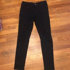 Black cut at knee jeans